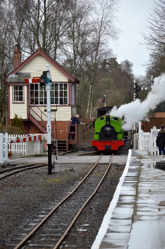 Barber entering Alston Station