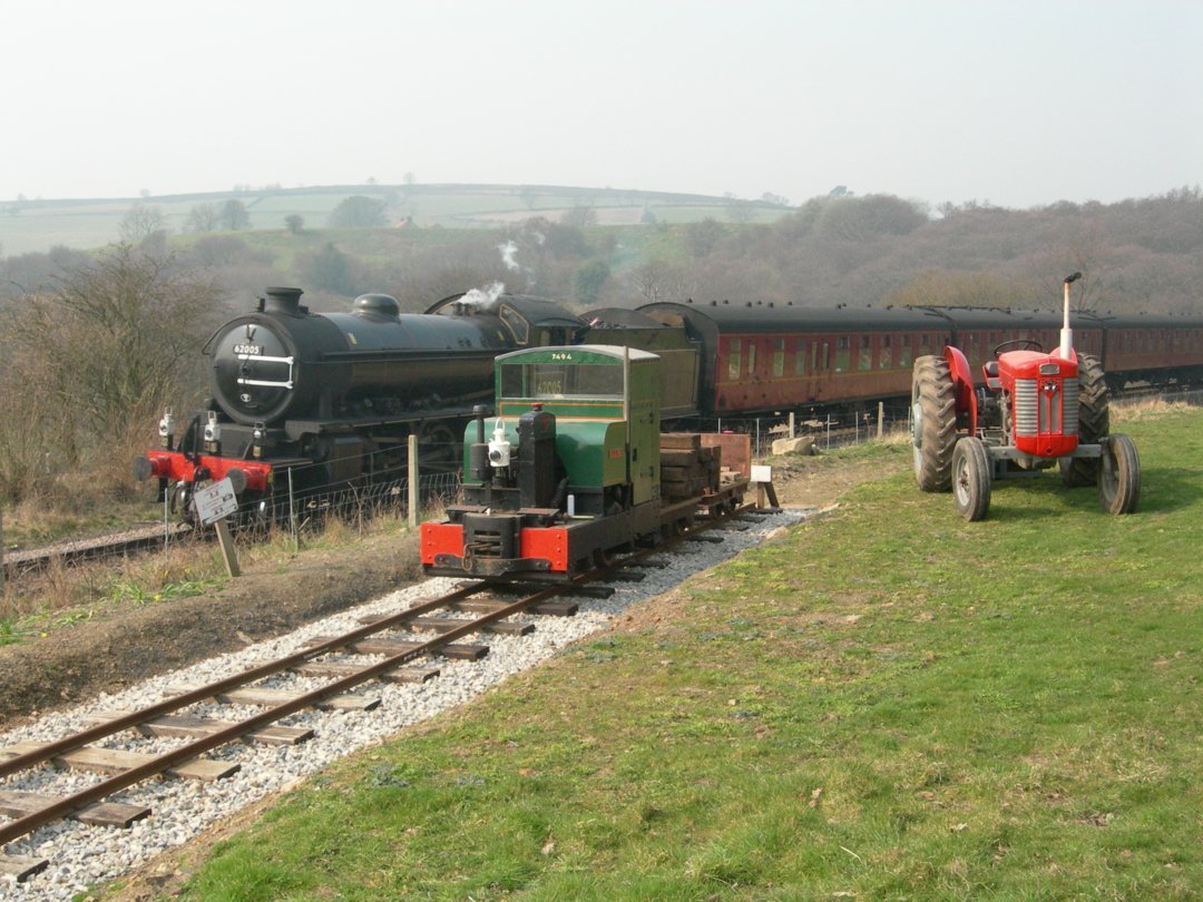 Steam train passing the Castleton Light Railway