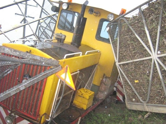 Locos 1 and 10. Level crossing where truck failed to stop. A huge mess!