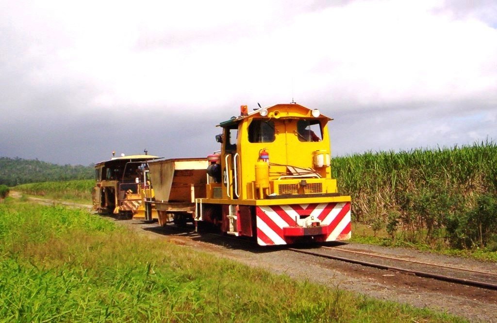 #22 tows the Ballast Hopper, Ballast plow, and the Plasser tamping Machine between jobs. April-07.