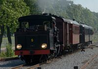 service train approaching Uppsala Östra