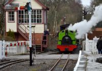 Barber entering Alston Station