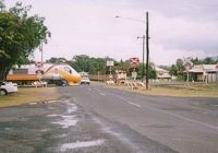 A Tilt Train crosses the 610mm cane line at Silkwood