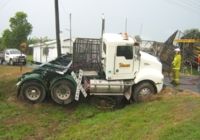 Locos 1 and 10. Level crossing where truck failed to stop. A huge mess!