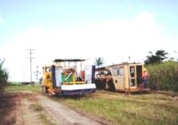 The weed spray train and the Plasser Tamping Machine cross at Cowley, Mar-07.