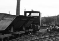 60s Simplex entering the yard with a train of skips.